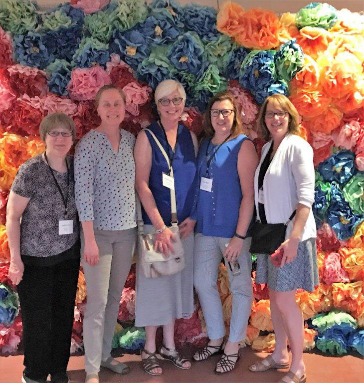 INVEST Health Leadership team, pictured left to right: Pauline Taylor, City of Iowa City Council Member, Kathryn Dorsey, Program Manager at UIHC Department of Pediatrics, Maryann Dennis, Director of the Housing Fellowship, Vickie Miene, Interim Director of the Iowa Institute of Public Health Research and Policy, and Tracy Hightshoe, Neighborhood Services Coordinator at the City of Iowa City.